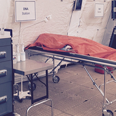 A Mobile Morgue Unit parked outside a hospital.