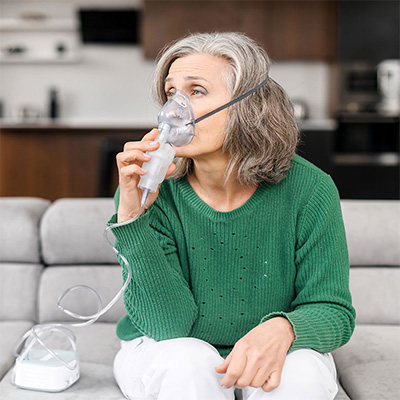 Patient using a nebulizer.